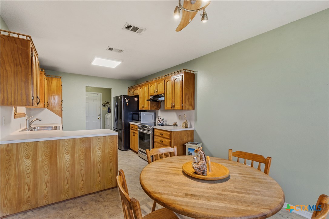 261 County Road 4963 Kempner, TX 76539 - Photo 17 of 44 a dining room with furniture and window
