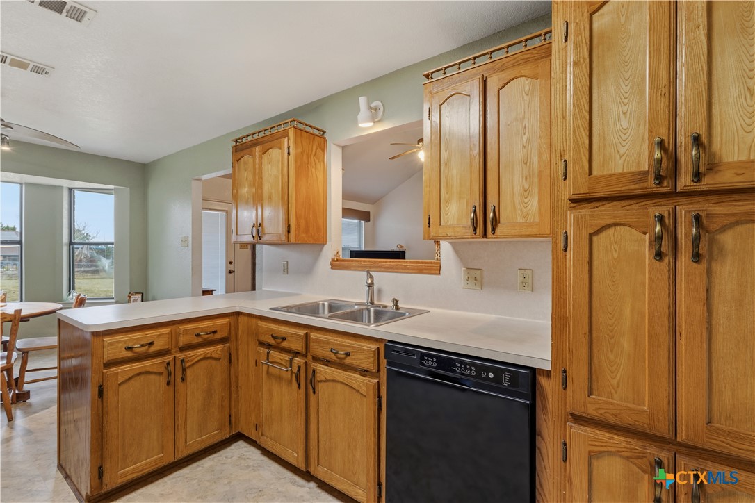261 County Road 4963 Kempner, TX 76539 - Photo 20 of 44 a kitchen with stainless steel appliances granite countertop a sink and a granite counter tops