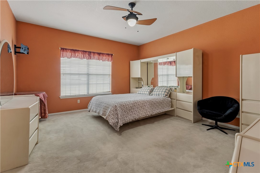 261 County Road 4963 Kempner, TX 76539 - Photo 23 of 44 a bedroom with a bed dresser and a window
