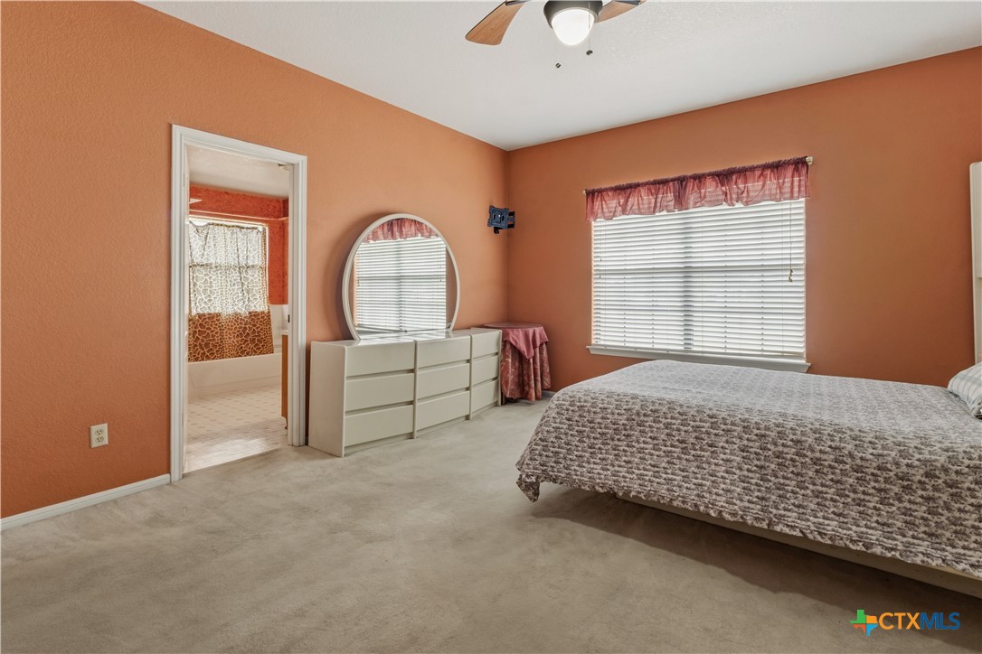261 County Road 4963 Kempner, TX 76539 - Photo 24 of 44 a bedroom with bed and window