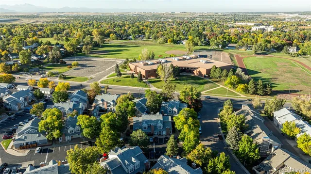 an aerial view of a house with a ocean view
