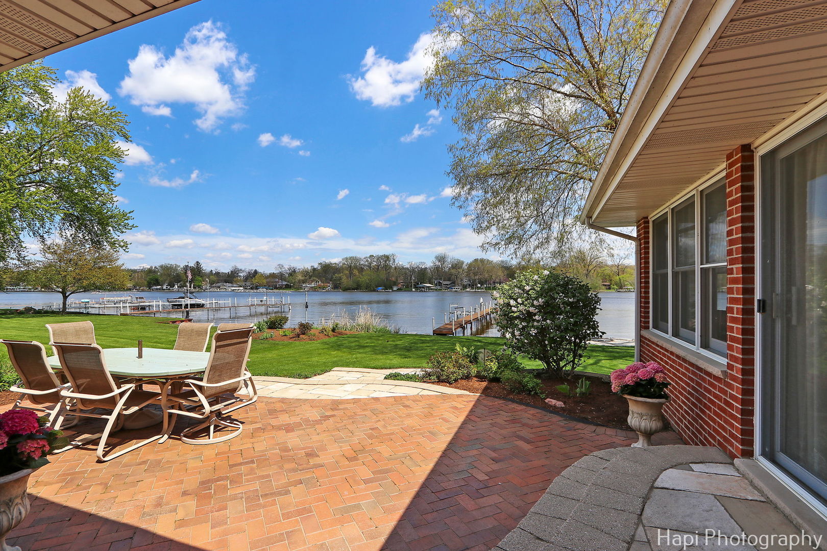 714 South Riverside Drive McHenry, IL 60050 - Photo 14 of 49 a view of a backyard with sitting area