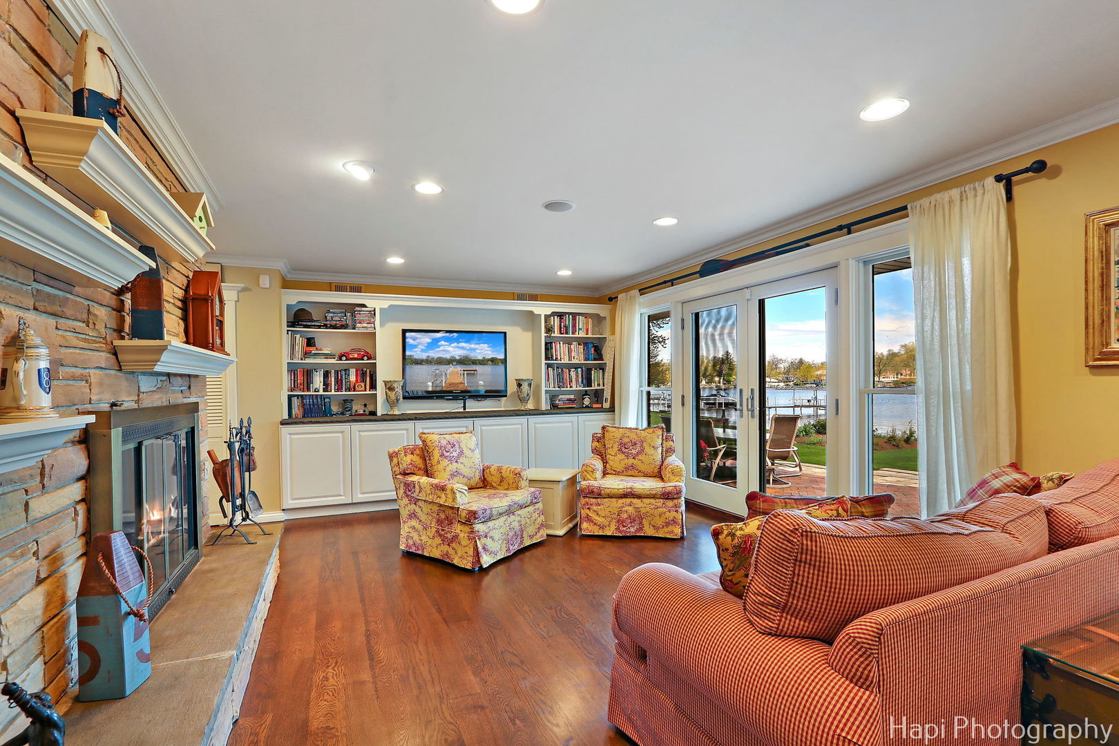 714 South Riverside Drive McHenry, IL 60050 - Photo 15 of 49 a living room with furniture and a fireplace