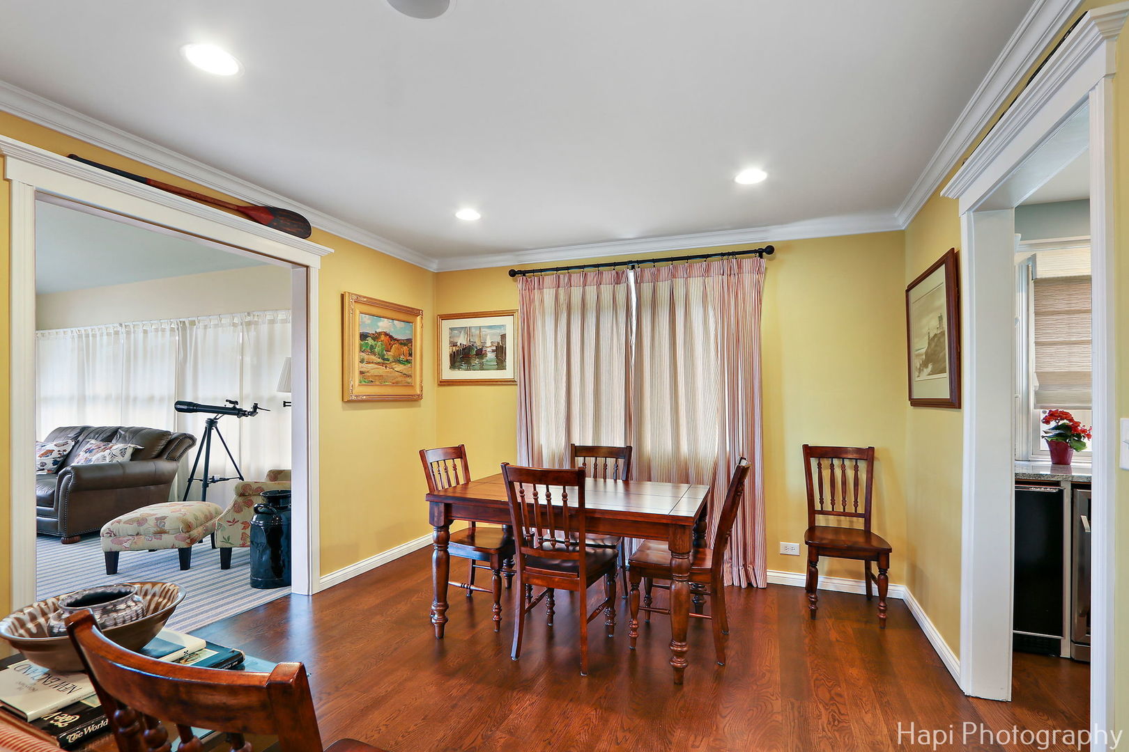 714 South Riverside Drive McHenry, IL 60050 - Photo 21 of 49 a view of a dining room with furniture and wooden floor