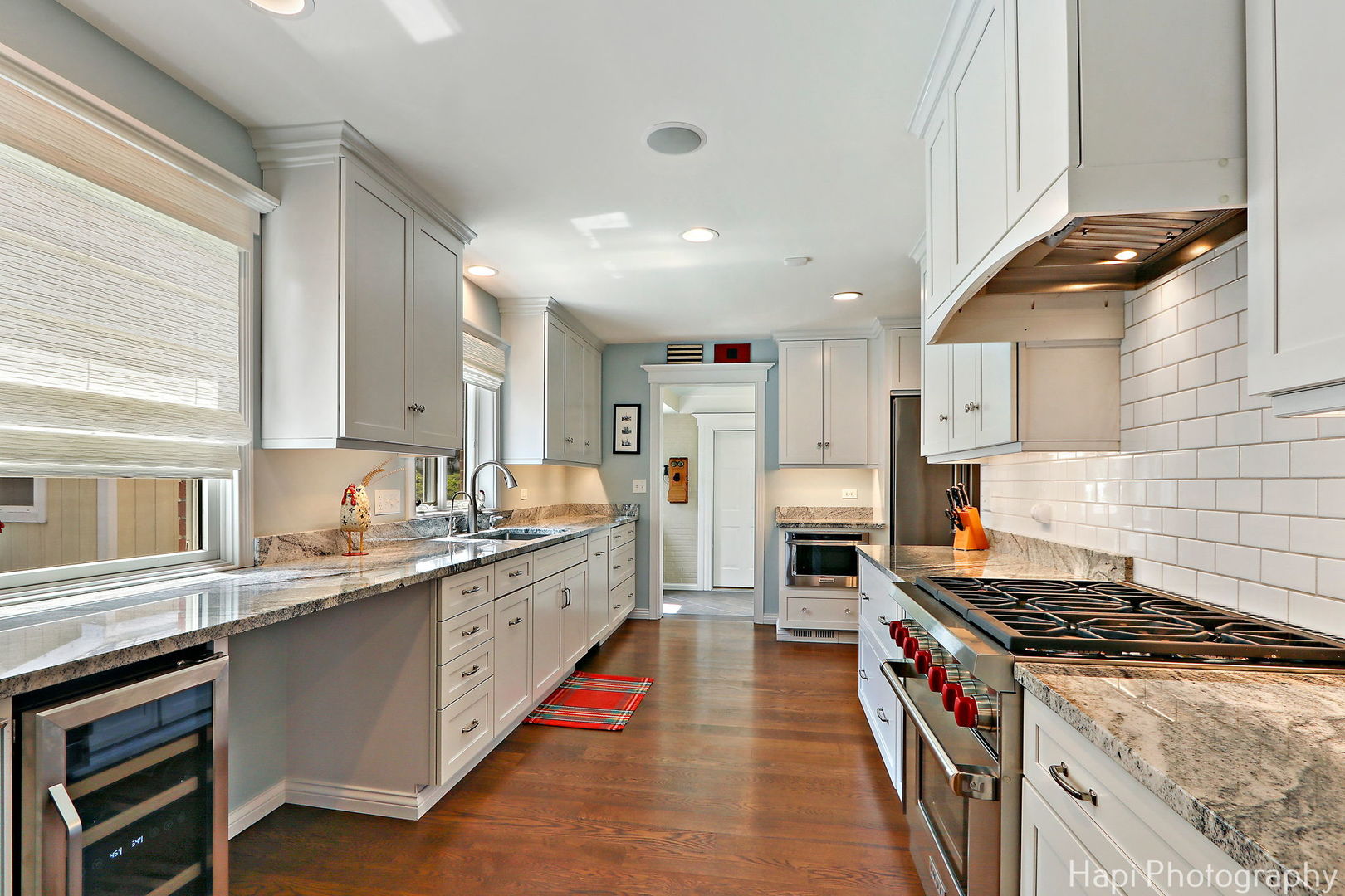714 South Riverside Drive McHenry, IL 60050 - Photo 22 of 49 a kitchen with stainless steel appliances granite countertop a stove and a sink