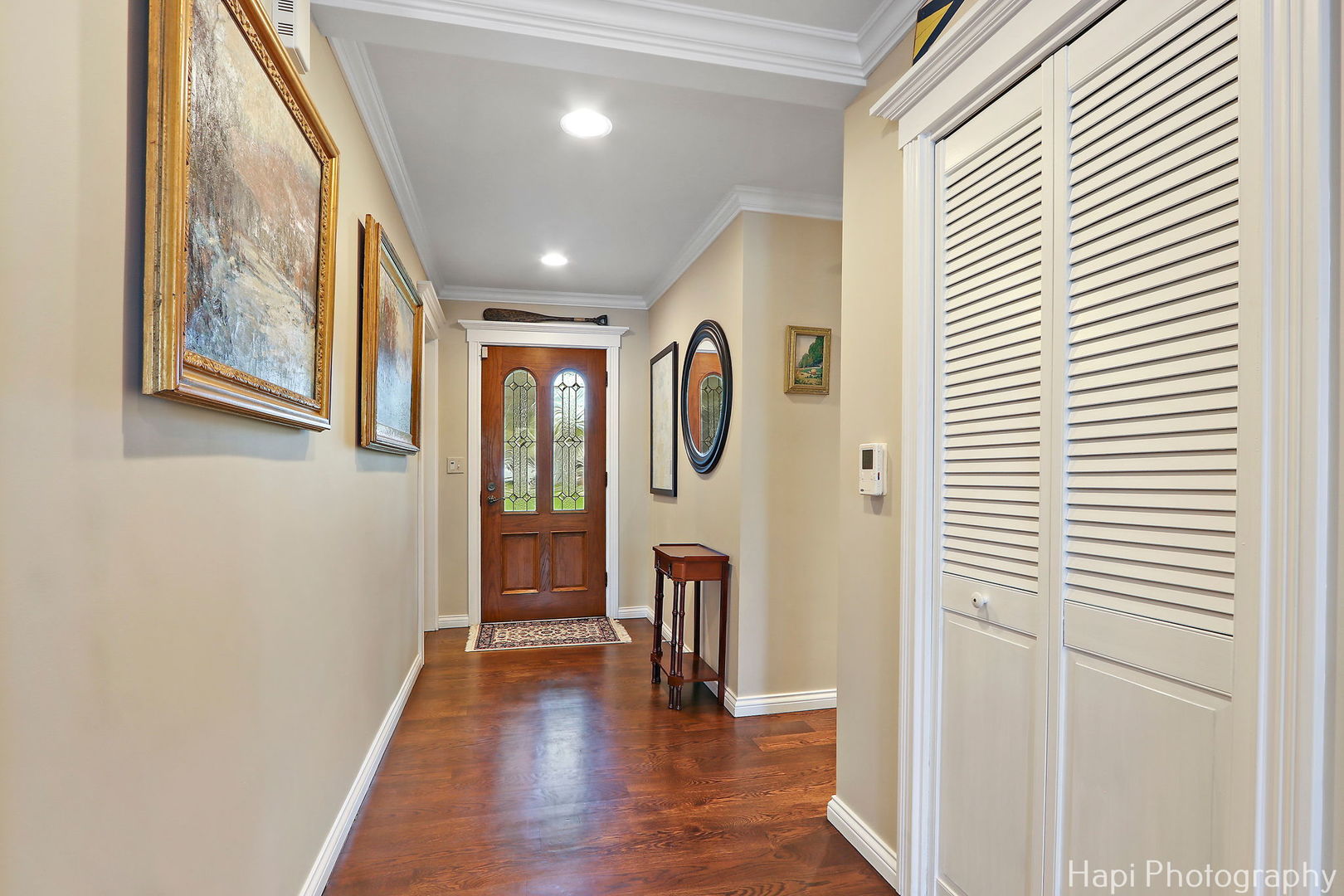 714 South Riverside Drive McHenry, IL 60050 - Photo 26 of 49 a view of a hallway with wooden floor and windows