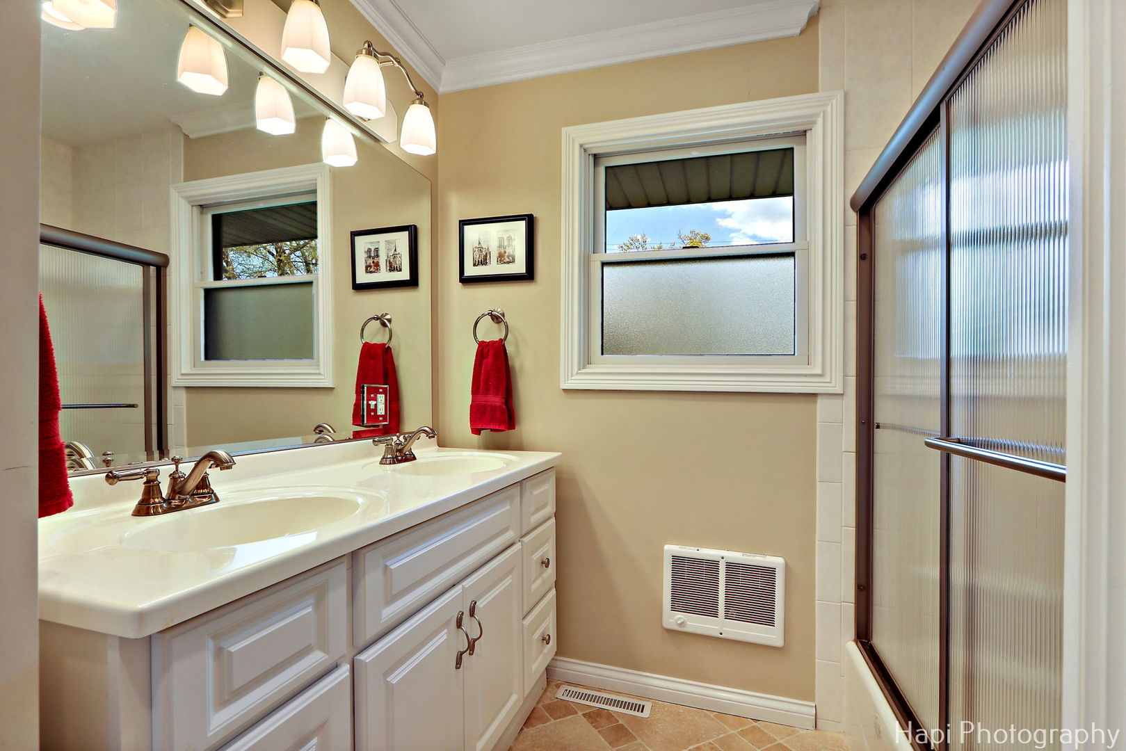 714 South Riverside Drive McHenry, IL 60050 - Photo 34 of 49 a bathroom with a sink and a mirror