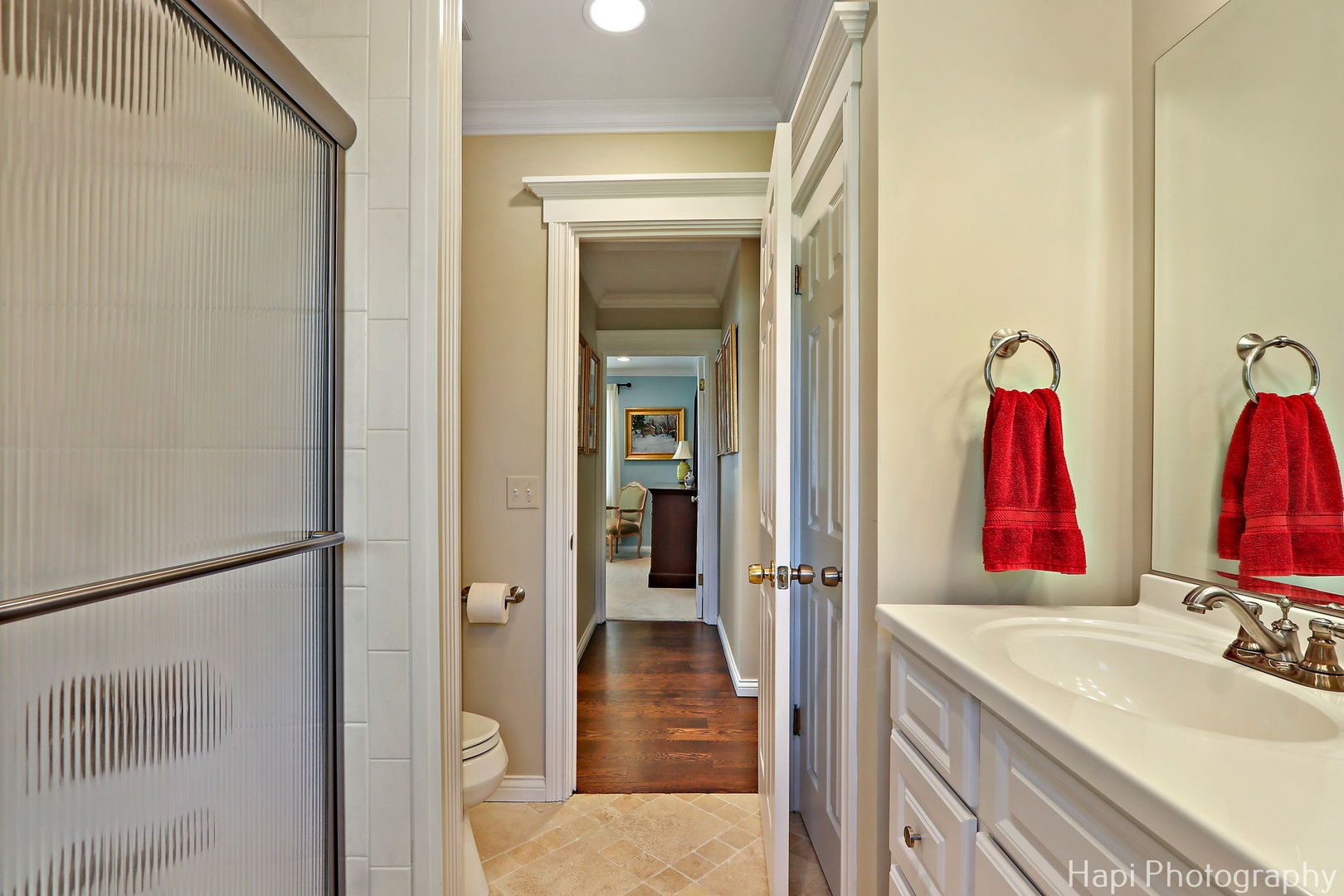 714 South Riverside Drive McHenry, IL 60050 - Photo 35 of 49 a bathroom with a sink and mirror with bathtub