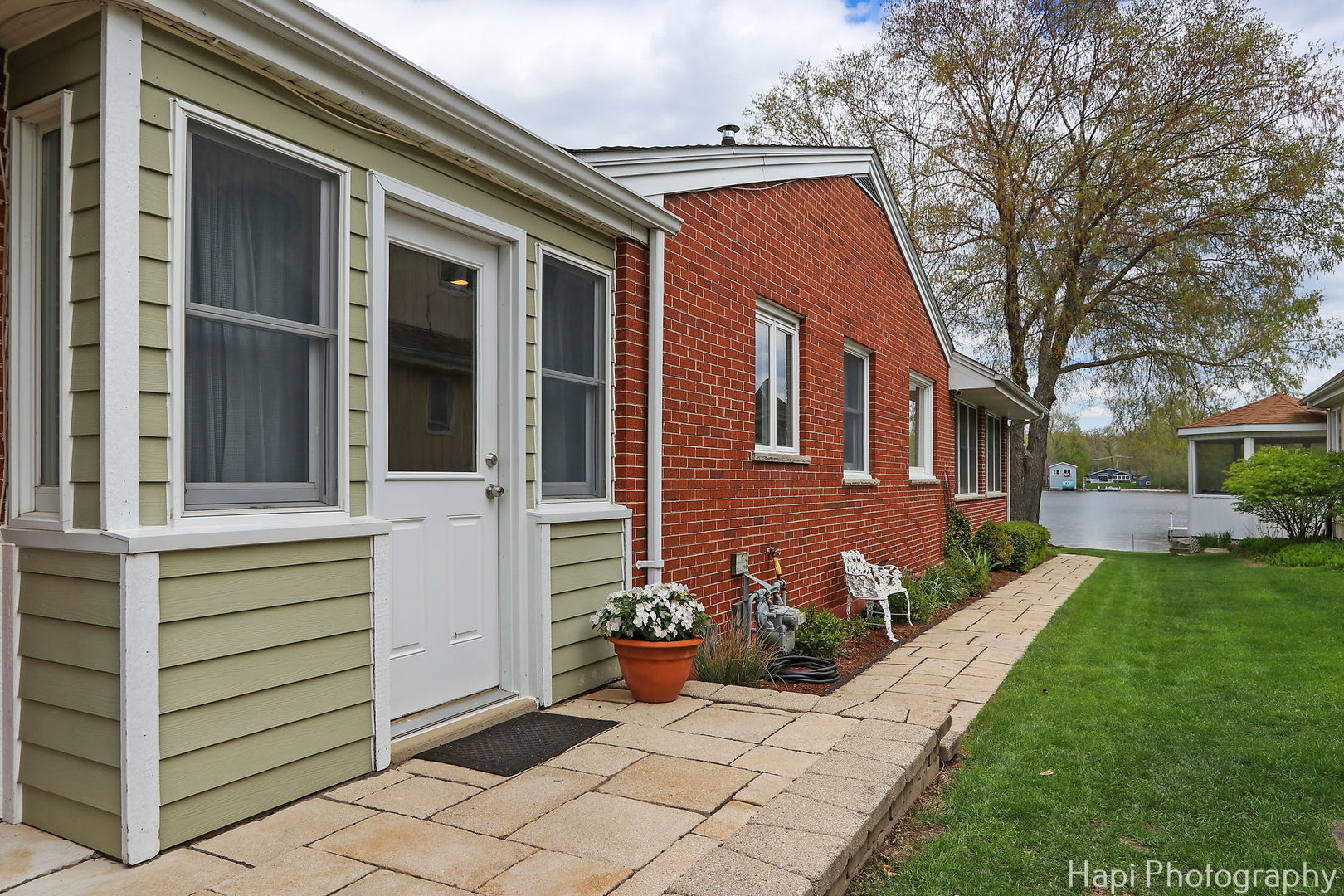 714 South Riverside Drive McHenry, IL 60050 - Photo 43 of 49 a front view of a house with a yard