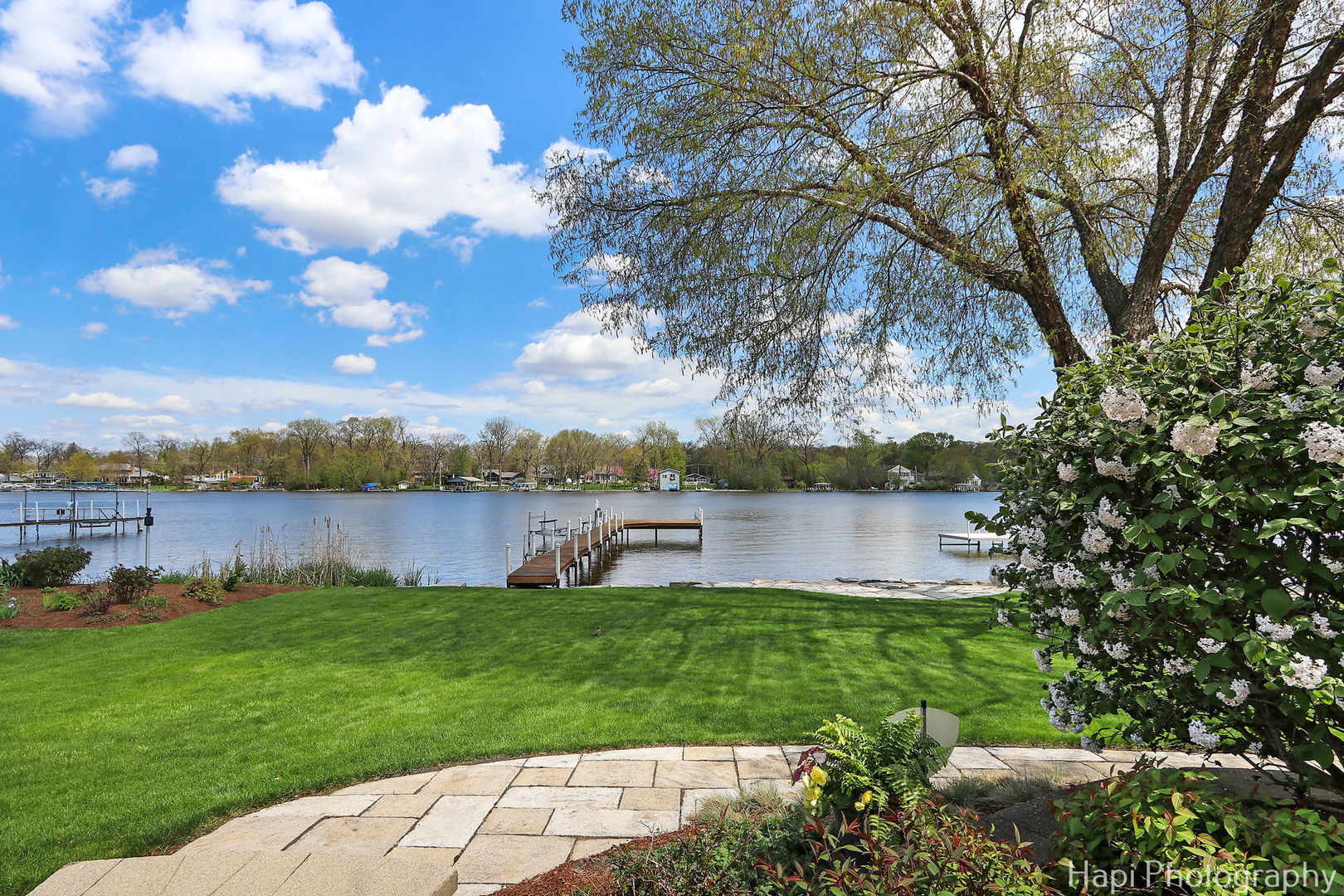 714 South Riverside Drive McHenry, IL 60050 - Photo 9 of 49 a view of a lake from a yard