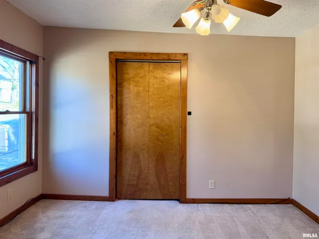 an empty room with window