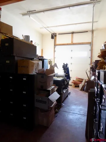 a view of a workspace with furniture