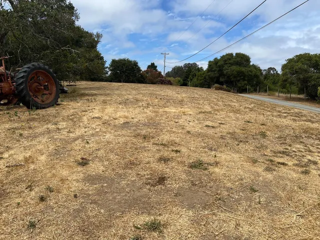 a view of a lake with mountains in the background