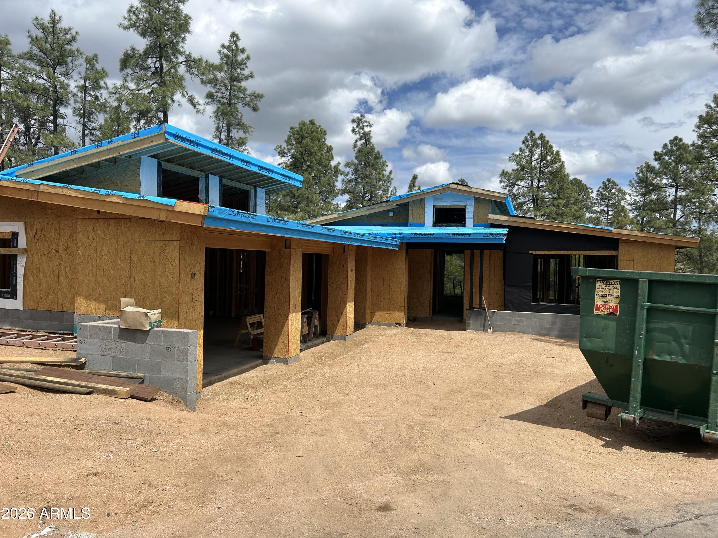 3002 East Game Trail Payson, AZ 85541 - Photo 7 of 10 a front view of a house with a yard and garage