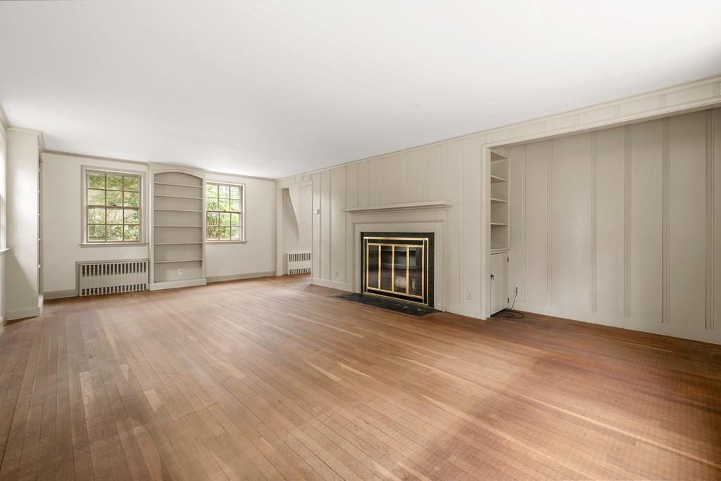 28 Montvale Road Weston, MA 02493 - Photo 13 of 26 an empty room with windows and fireplace