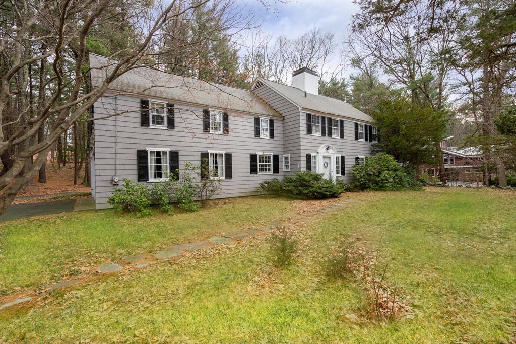 28 Montvale Road Weston, MA 02493 - Photo 3 of 26 a front view of a house with a yard