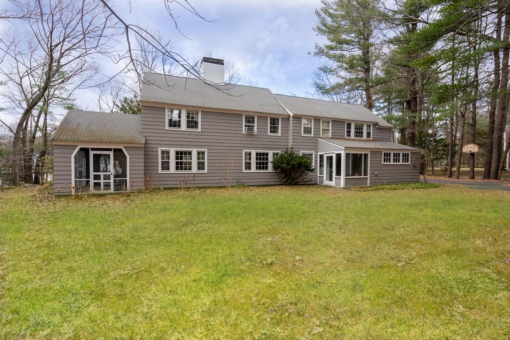 28 Montvale Road Weston, MA 02493 - Photo 8 of 26 a front view of a house with a garden