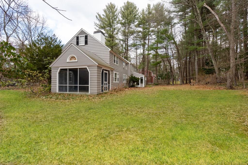 28 Montvale Road Weston, MA 02493 - Photo 10 of 26 a front view of a house with yard and green space