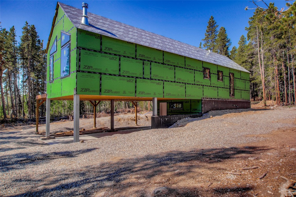 472 Vots Drive Fairplay, CO 80440 - Photo 11 of 40 a green field covered with tall trees