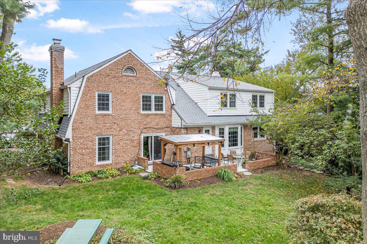 9809 Canal Road Gaithersburg, MD 20886 - Photo 45 of 50 a view of a house with a yard