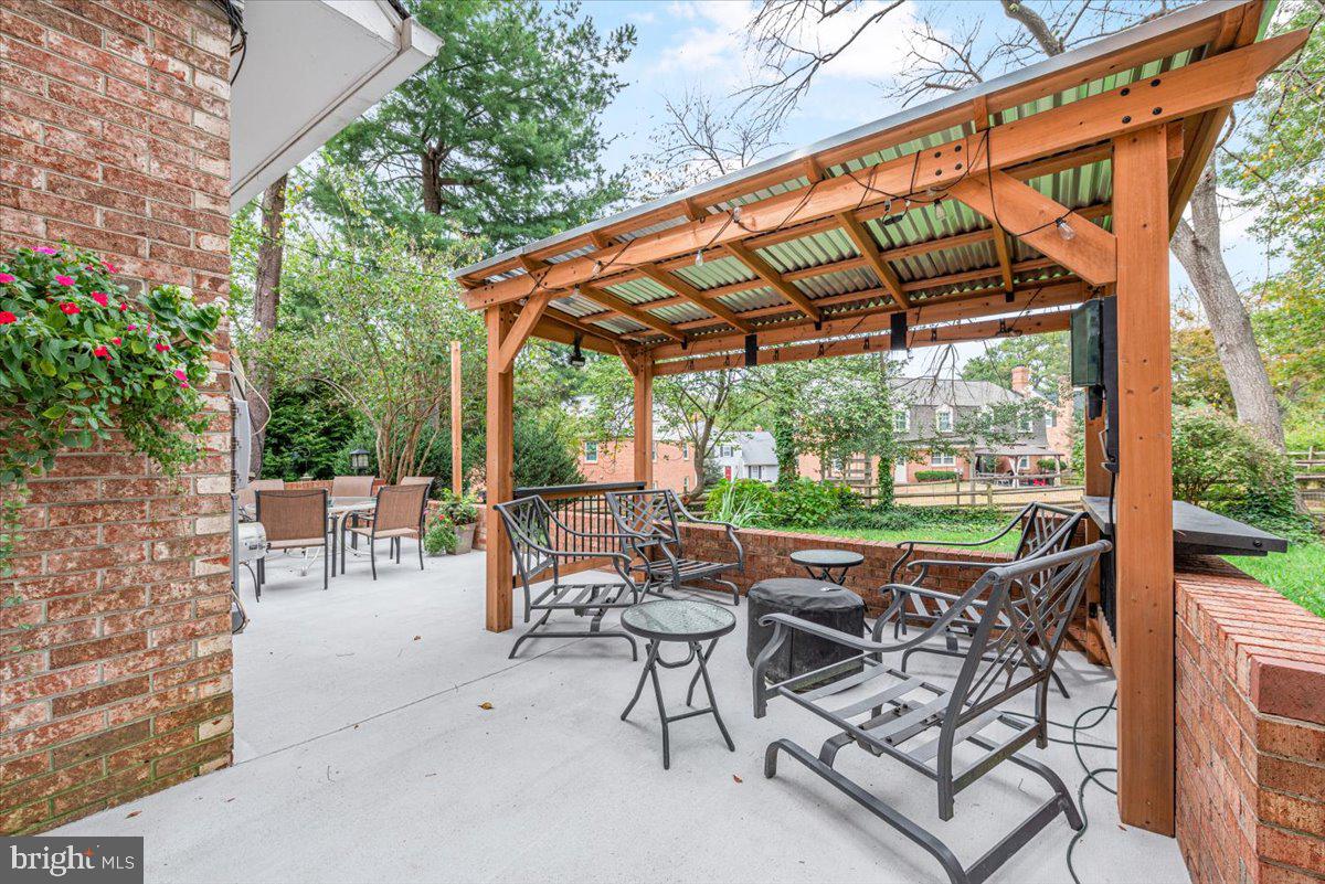 9809 Canal Road Gaithersburg, MD 20886 - Photo 46 of 50 a view of patio with chairs and a patio