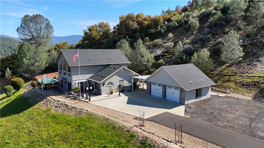42038 Empty Creek Road Oakhurst, CA 93644 - Photo 34 of 66 Carport and two car garage at home location