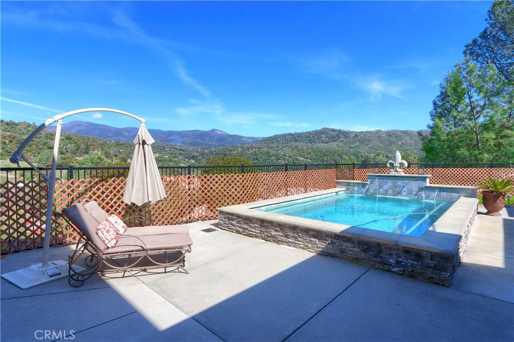 42038 Empty Creek Road Oakhurst, CA 93644 - Photo 41 of 66 3 water falls and ledge seating year round fun