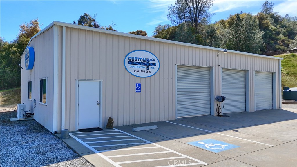 42038 Empty Creek Road Oakhurst, CA 93644 - Photo 60 of 66 2 offices, 3 bays water dryer hookups bathroom w/shower mini split & built in cabinetry