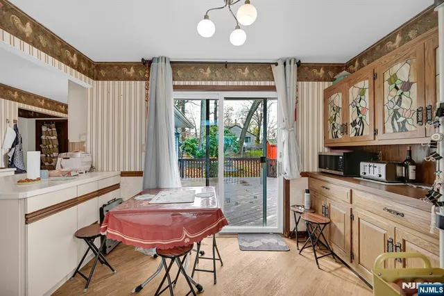 a view of a kitchen and dining room