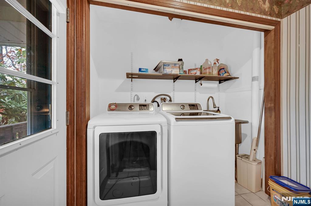 699 Shore Road West Milford, NJ 07421 - Photo 25 of 50 a utility room with dryer and washer