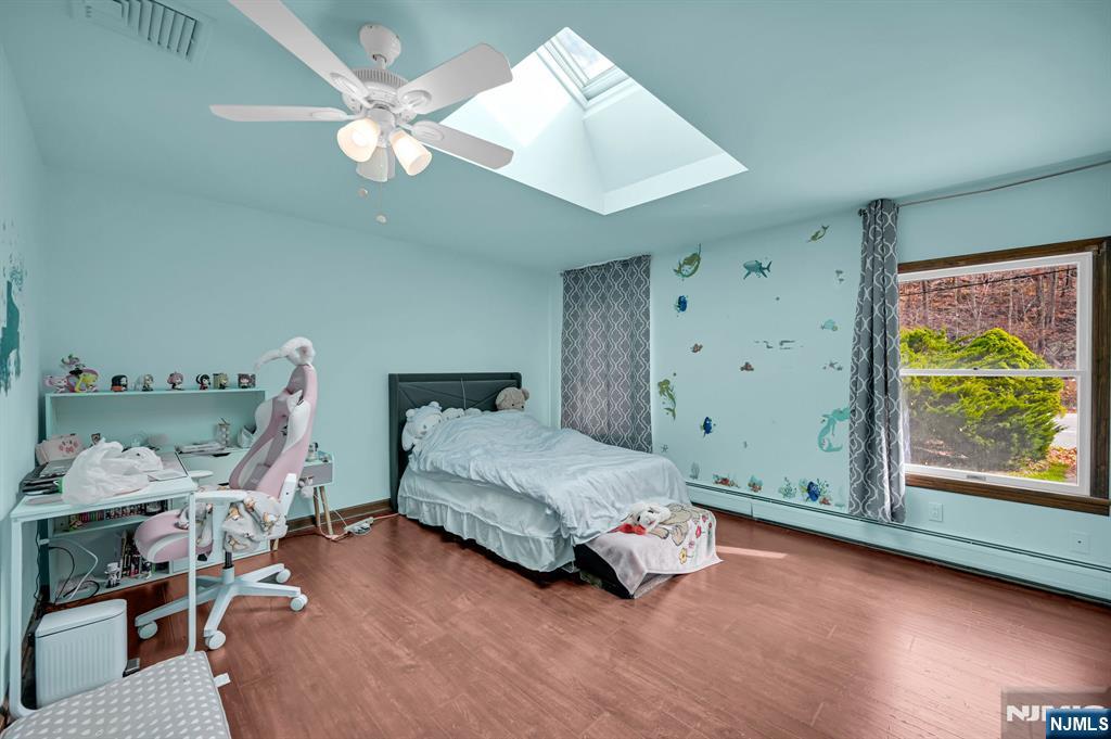 699 Shore Road West Milford, NJ 07421 - Photo 30 of 50 a bedroom with a bed and a window