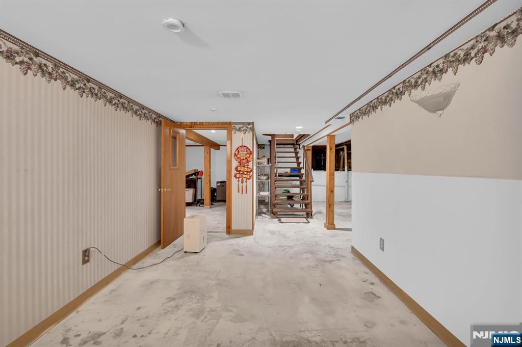 699 Shore Road West Milford, NJ 07421 - Photo 36 of 50 a view of a livingroom with walk in closet and bedroom