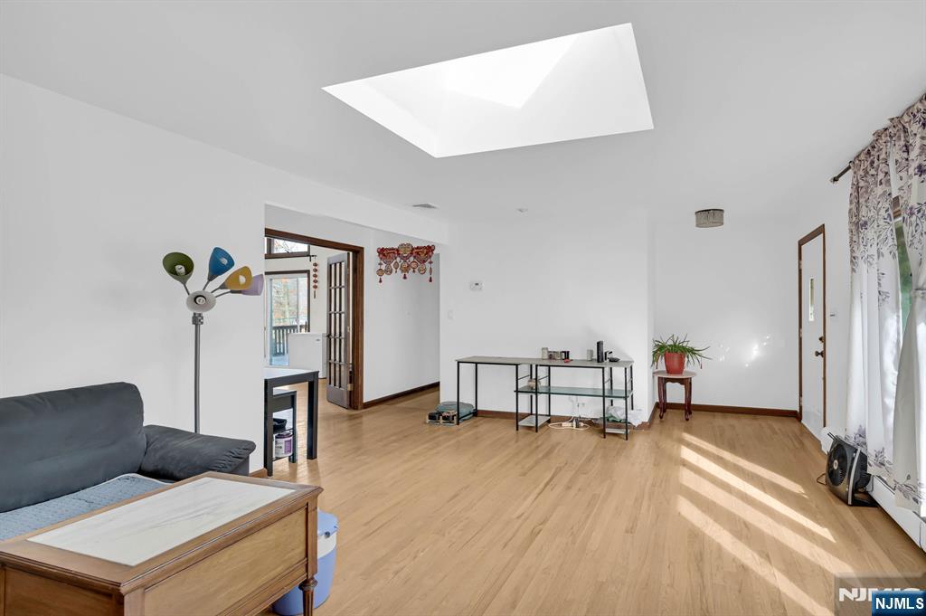 699 Shore Road West Milford, NJ 07421 - Photo 6 of 50 a bedroom with furniture and a wooden floor