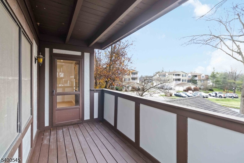22 Heritage Drive, Unit C Chatham, NJ 07928 - Photo 19 of 27 a view of balcony with wooden floor
