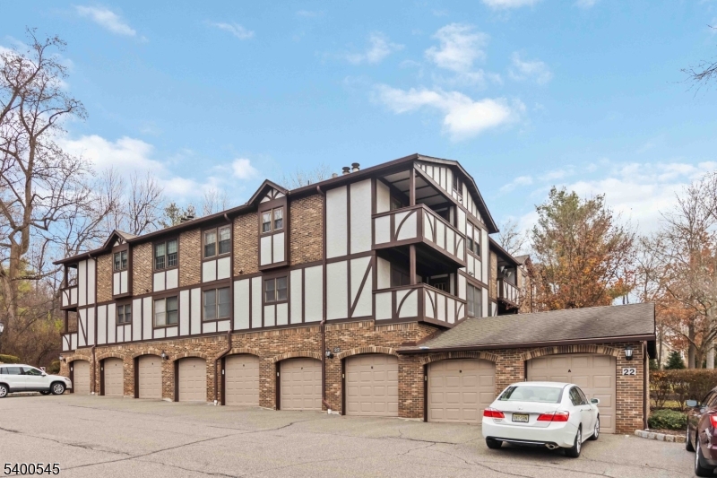 22 Heritage Drive, Unit C Chatham, NJ 07928 - Photo 22 of 27 a car parked in front of a building