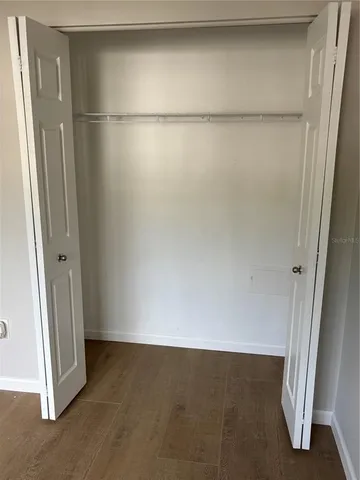 a view of swimming pool with small garden