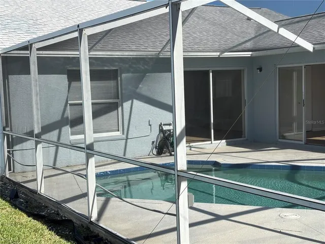 a bathroom with a stove and a toilet