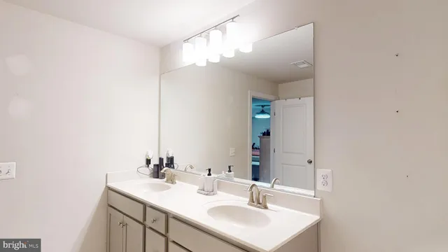 a view of a livingroom with furniture and wooden floor