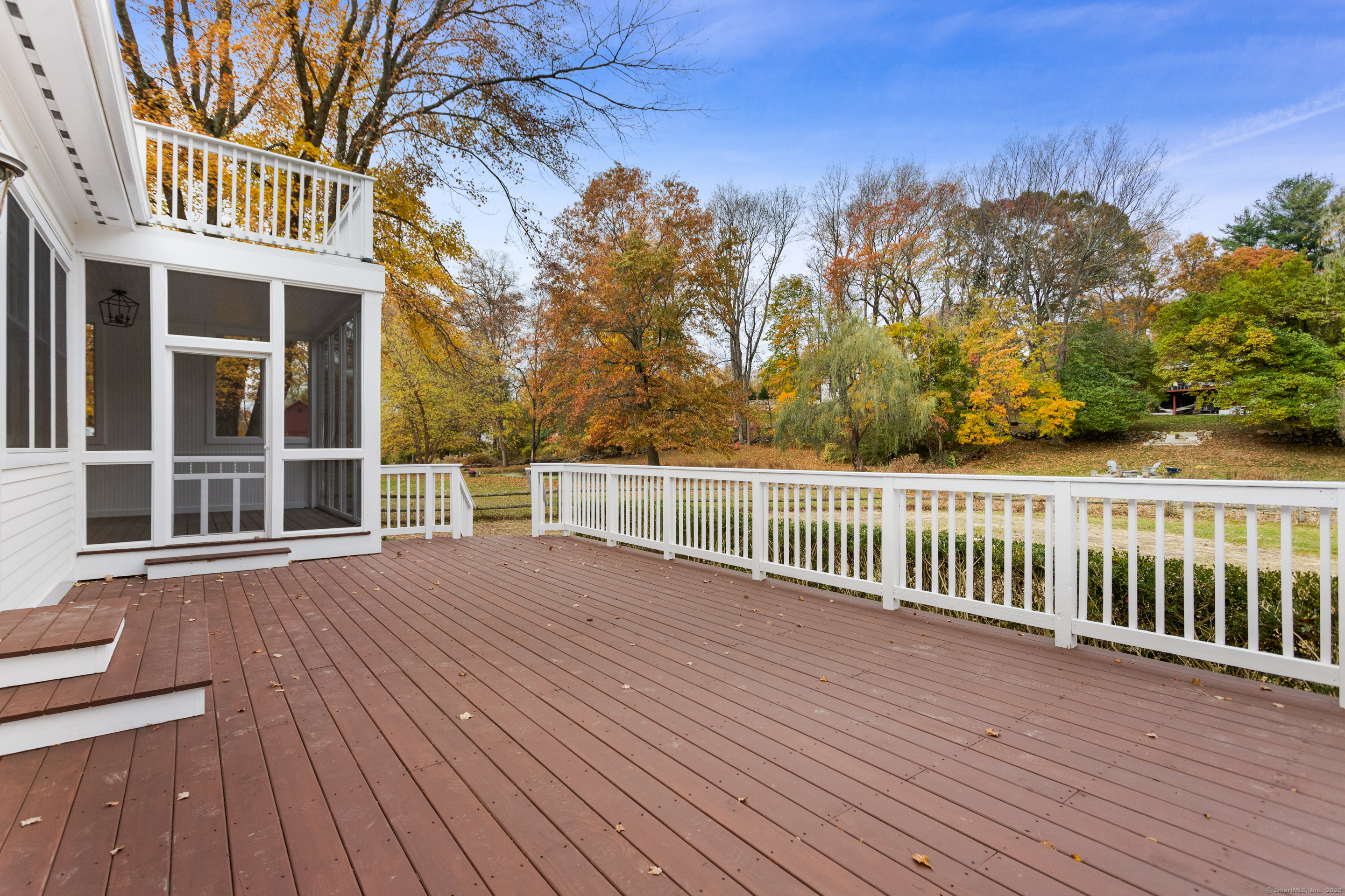 123 Greens Farms Road Westport, CT 06880 - Photo 12 of 40 a view of a balcony with wooden floor and fence