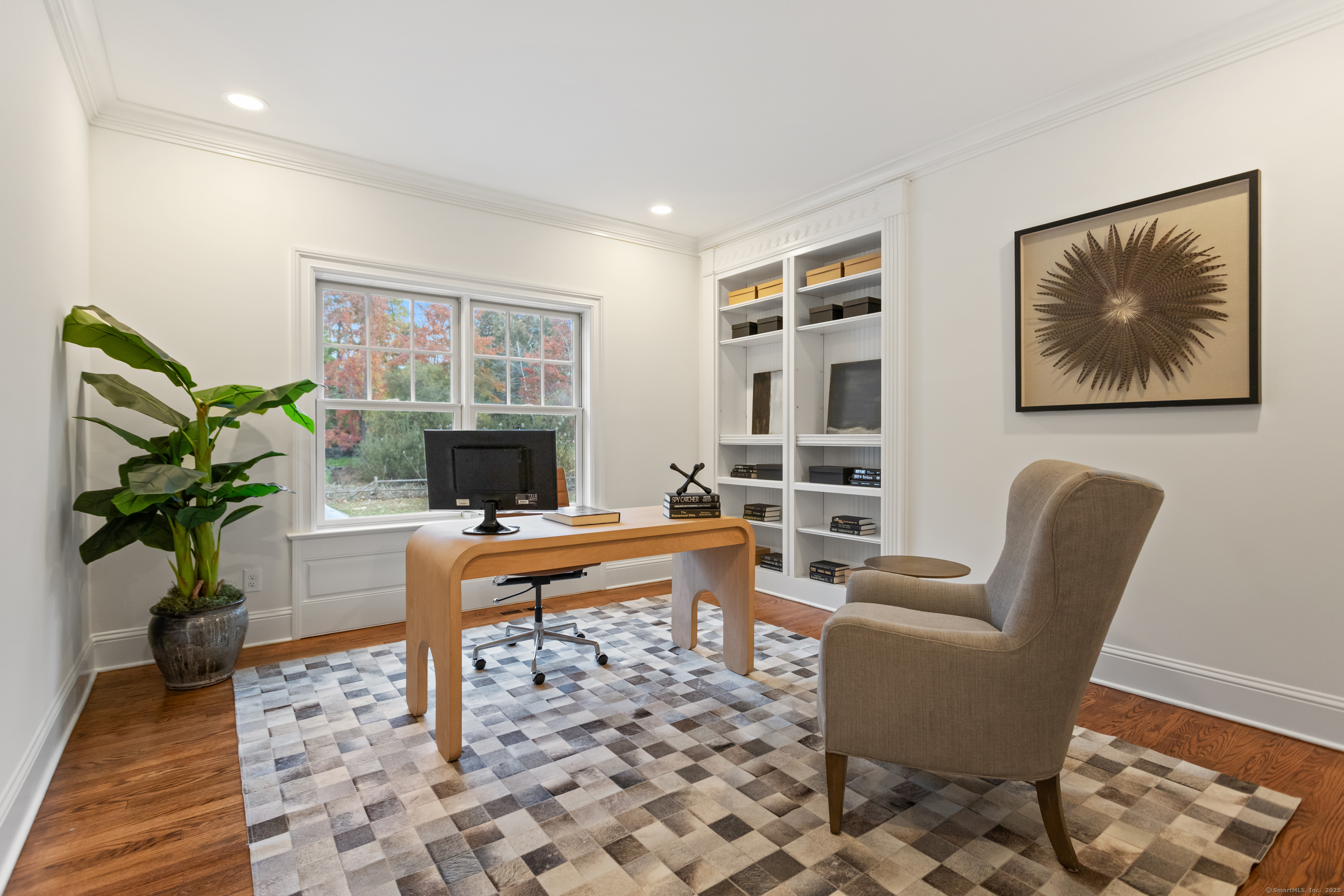 123 Greens Farms Road Westport, CT 06880 - Photo 17 of 40 a living room with furniture a window and a fireplace