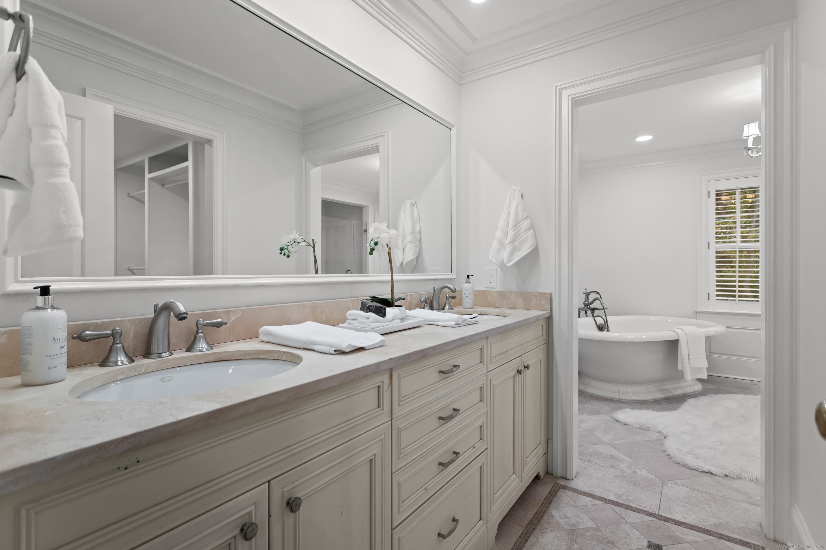 123 Greens Farms Road Westport, CT 06880 - Photo 22 of 40 a bathroom with a double vanity sink mirror and double