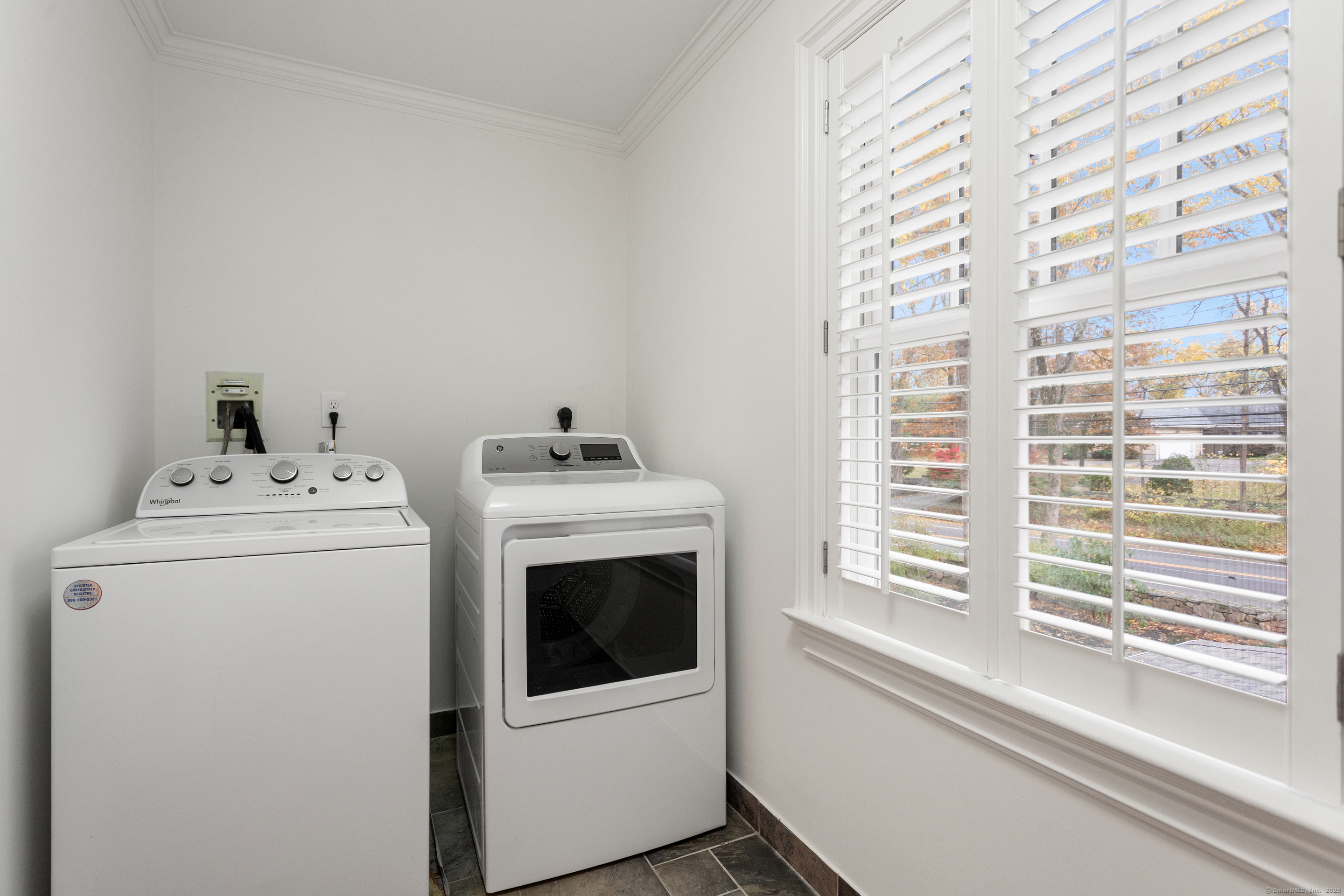 123 Greens Farms Road Westport, CT 06880 - Photo 30 of 40 a utility room with dryer and washer
