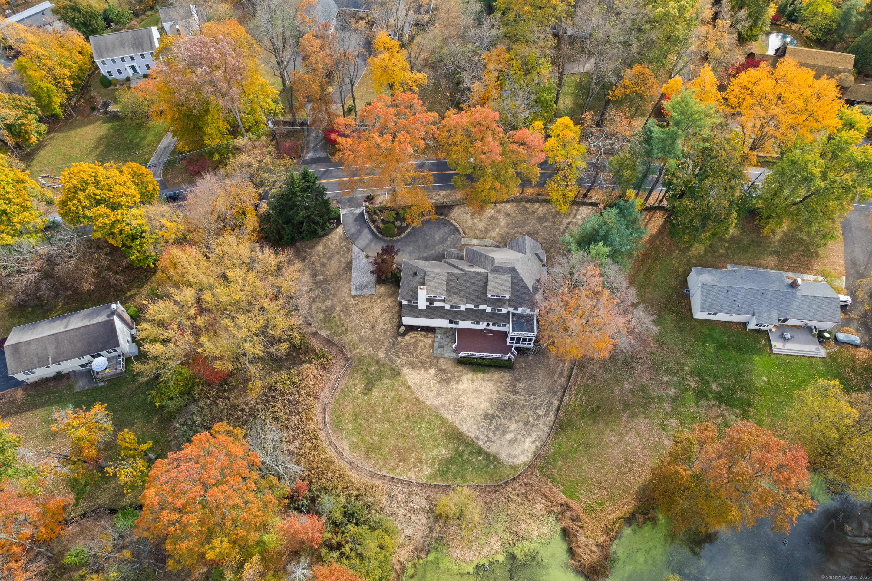 123 Greens Farms Road Westport, CT 06880 - Photo 3 of 40 an aerial view of a house with a yard basket ball court and outdoor seating