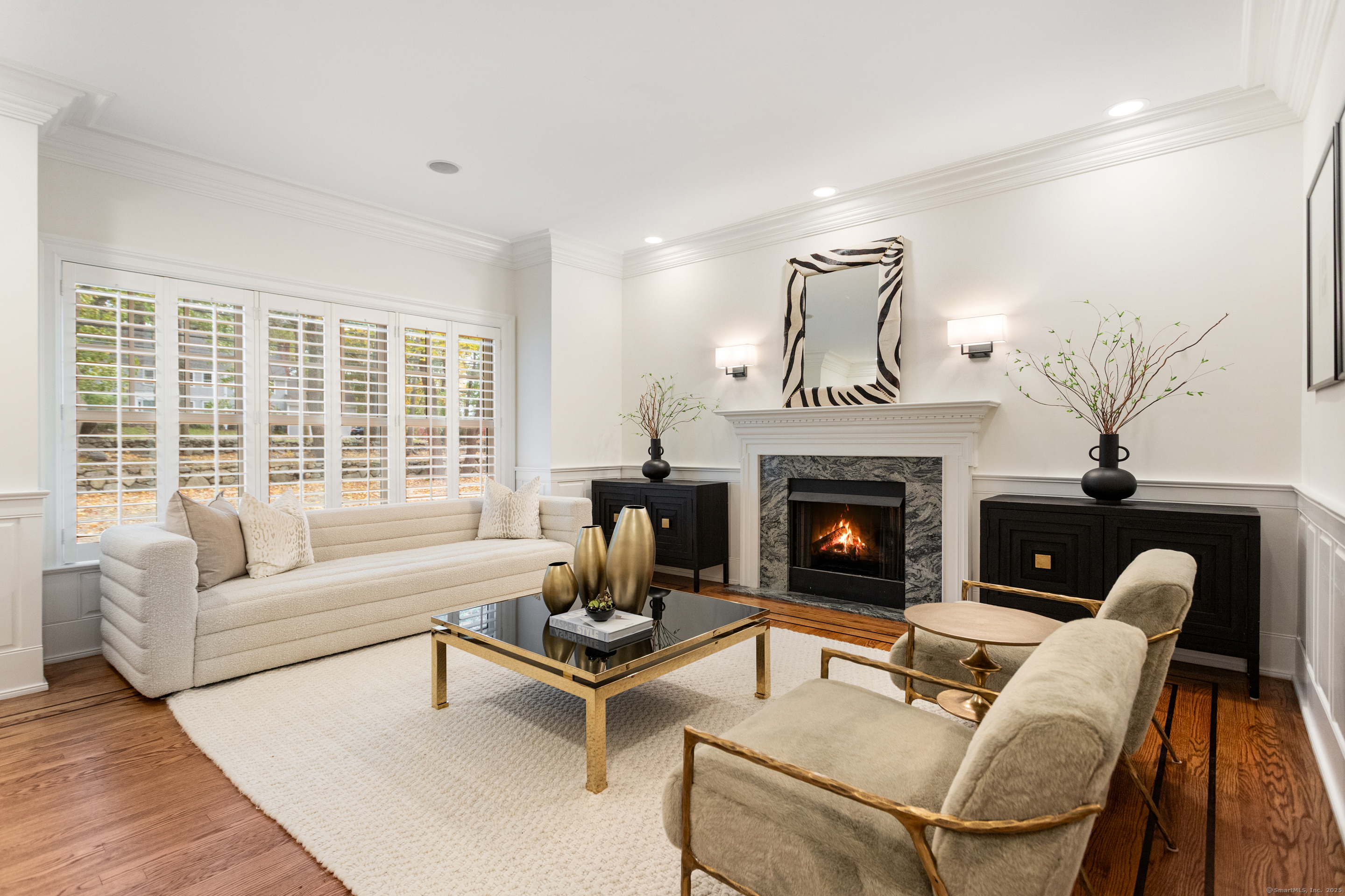 123 Greens Farms Road Westport, CT 06880 - Photo 6 of 40 a living room with furniture and a fireplace