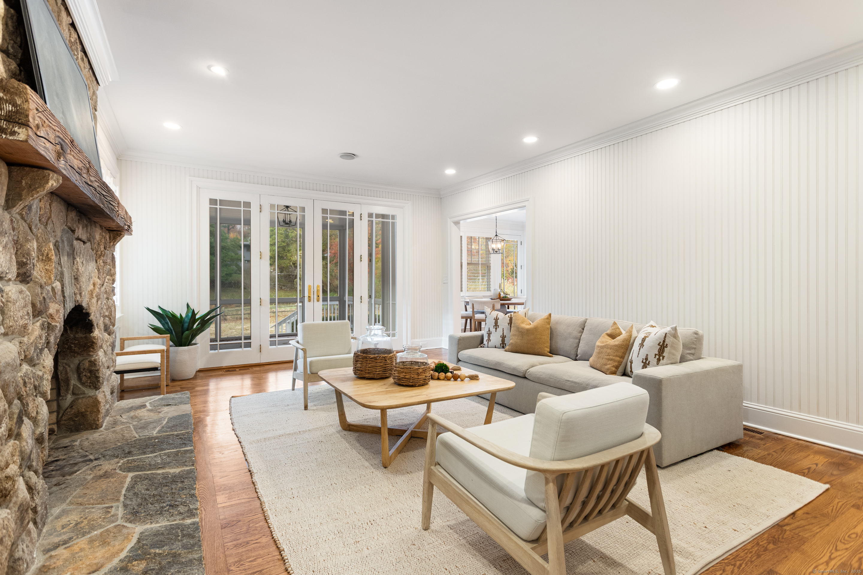 123 Greens Farms Road Westport, CT 06880 - Photo 10 of 40 a living room with furniture and a potted plant