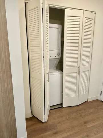 a view of a bathroom with wooden floor