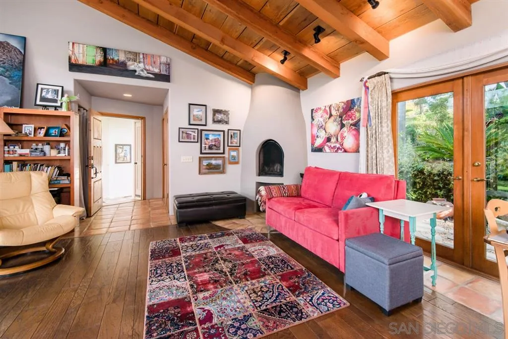 16722 Via Lago Azul Rancho Santa Fe, CA 92067 - Photo 12 of 20 a living room with furniture and a rug