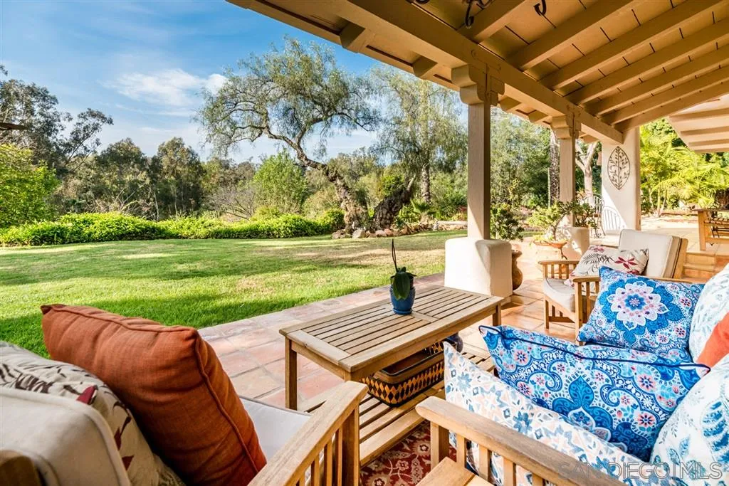 16722 Via Lago Azul Rancho Santa Fe, CA 92067 - Photo 13 of 20 a view of a backyard with sitting area