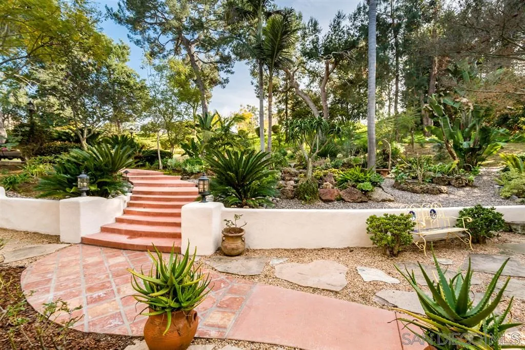 16722 Via Lago Azul Rancho Santa Fe, CA 92067 - Photo 19 of 20 a view of a flower in a garden