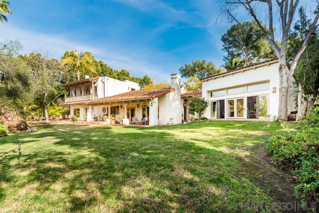 16722 Via Lago Azul Rancho Santa Fe, CA 92067 - Photo 20 of 20 a front view of a house with a garden
